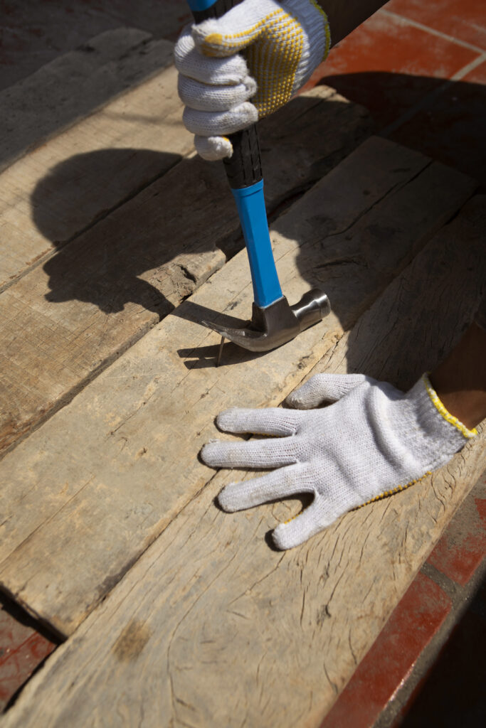 construction-worker-using-hammer-job-site